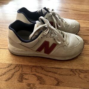 New Balance Size 9.  Cream colored with navy trim and burgundy/gold decal.